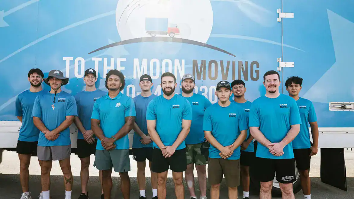 a team of To The Moon Moving company